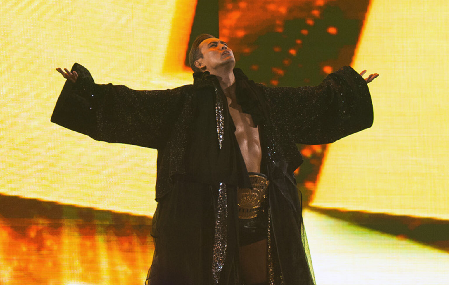 What Is Okada’s New Song? Hear the Theme That Replaced ‘Rain Maker’