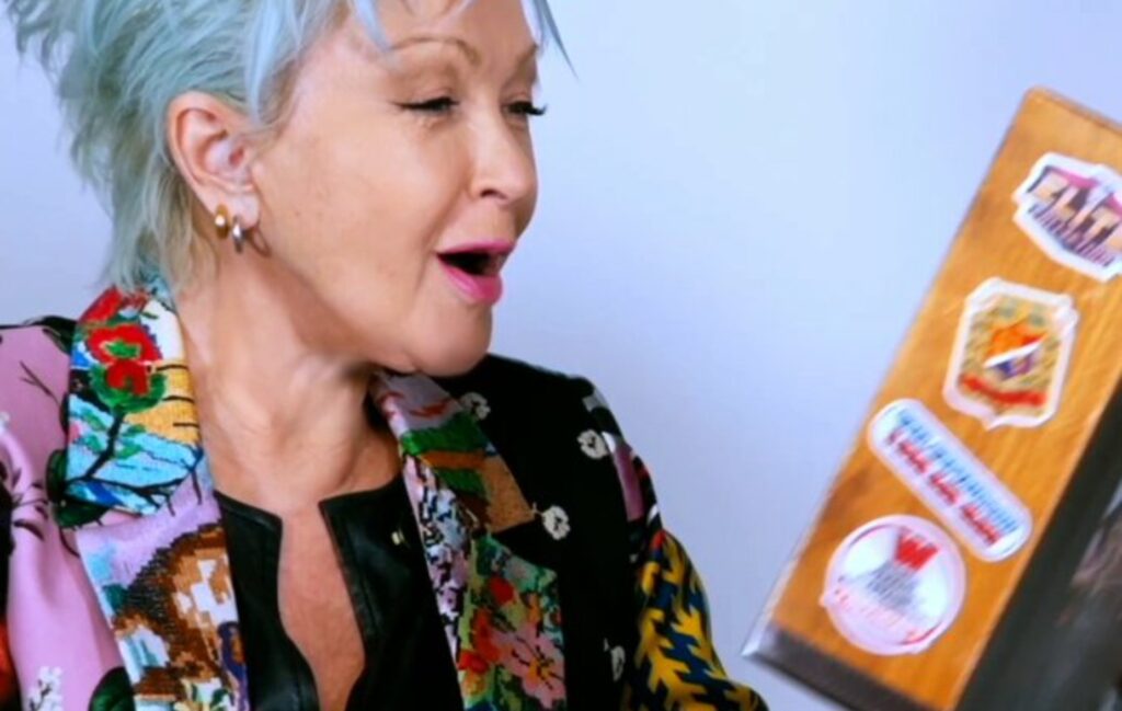 Cyndi Lauper reacts to her first WWE action figure from Mattel